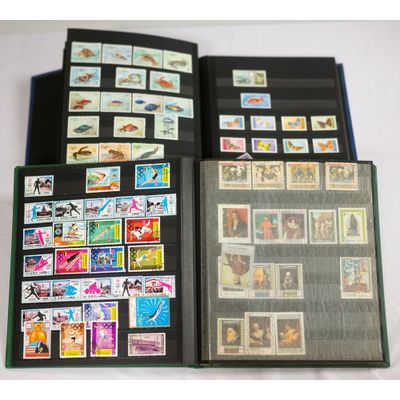 a lot of stamps on the pages of a book