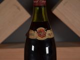 a bottle of wine that is sitting on a table