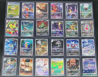 Il y a beaucoup de cartes Pokémon dans cette boîte.