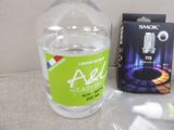 a bottle of water and a package of cigarettes on a table