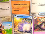 a lot of pokemon cards that are on the table