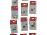 six sachets de décorations de Noël variées sur fond blanc