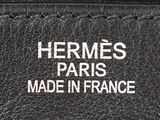 Logo « Hermès Paris Made in France » à l'intérieur d'un sac noir