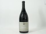 a bottle of wine that is sitting on a table