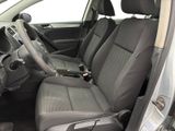 the interior of a car with a steering wheel and a seat belt