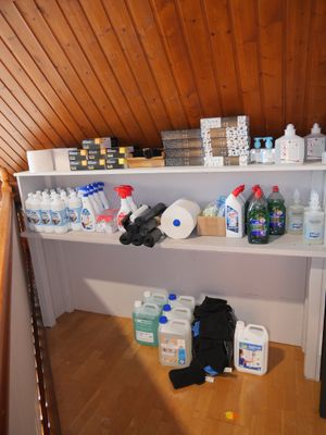 many bottles of water on the shelves in the room