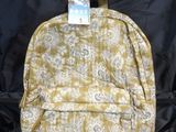 a close up of a backpack with a tag on it