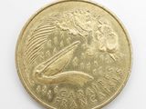 an image of a close up of a coin on a white surface