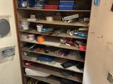 a cabinet with a lot of tools on top of it