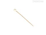 a small wooden stick with a white ball on it
