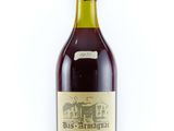 a bottle of wine that is sitting on a table