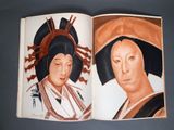 an open book with a picture of a woman and a man on it