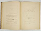 an open book with a drawing of a bird on it