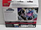 a close up of a box with a pokemon figure inside of it