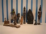 a lot of wooden figurines on a table