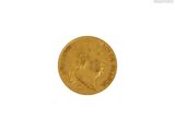 a close up of a gold coin on a white background