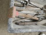 a lot of tools that are laying out on the floor