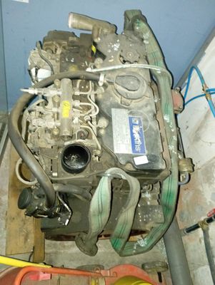 a small engine that is sitting in the middle of a room