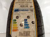 a close up of a tire with a sticker on the side of it