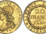 a gold coin with a woman ' s head on it