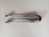 two spoons that are sitting on a table