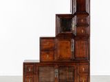 an image of a set of five wooden cabinets