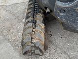 a close up of a tractor tire on the ground