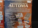 two boxes of automa cards sitting on a table