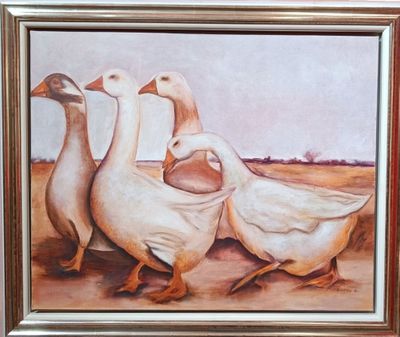 trois canards qui se tiennent les uns à côté des autres