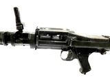 a gun that is sitting on top of a table