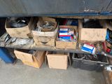 many boxes of assorted items on a shelf