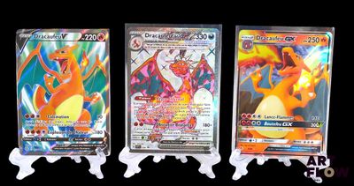 three different types of pokemon cards on display on a black background