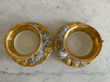pair of antique gold plated candlestick holders with floral designs