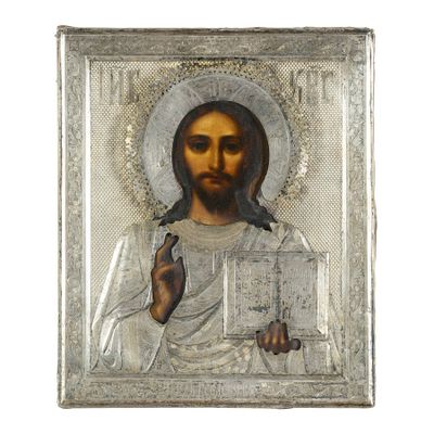 une image représentant une icône religieuse de Jésus tenant un livre