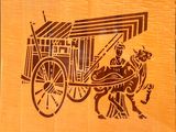 a picture of a man riding a horse drawn carriage