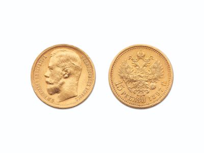 deux souverains d'or, l'un représentant la tête d'un homme et l'autre orné d'une couronne