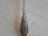 a spoon that is sitting on a table