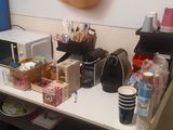 a table with a bunch of items on it in a room