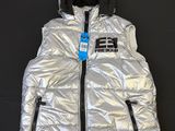a silver puffer vest with a hood on a black background