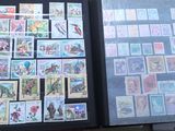 a lot of stamps that are in a book