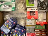 a cardboard box filled with assorted items for sale