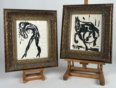 une paire de tableaux encadrés représentant un homme et une femme à cheval