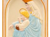 an image of a ceramic figurine of the virgin mary and child jesus