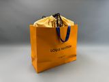 sac de courses Louis Vuitton jaune avec des anses bleues