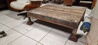 Table basse, piètement fer dessus bois et un fauteuil dans l… (photo 2)
