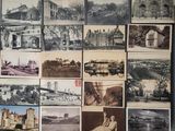 many pictures of old buildings that are on the wall