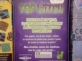a box of top witch cookies next to a box of cookies