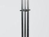 an image of a metal coat stand with five coats on it