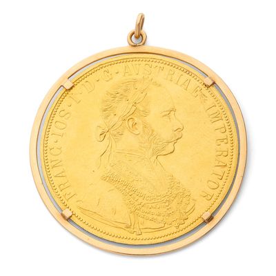 l'image d'une pièce d'or sur laquelle figure le visage d'une femme