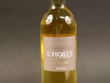 a bottle of wine that is sitting on a table